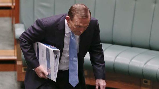 Prime Minister Tony Abbott arrives for question time. Photo: Alex Ellinghausen