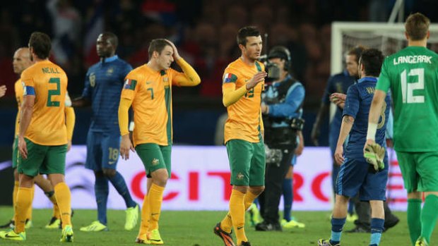 Heads down: the Socceroos have plenty to think about ahead of their next test against Canada.