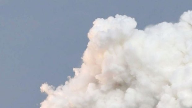 In this Wednesday, Dec. 3, 2014 photo, an H2-A rocket carrying space explorer Hayabusa2 lifts off from a launching pad at Tanegashima Space Center in Kagoshima, southern Japan.