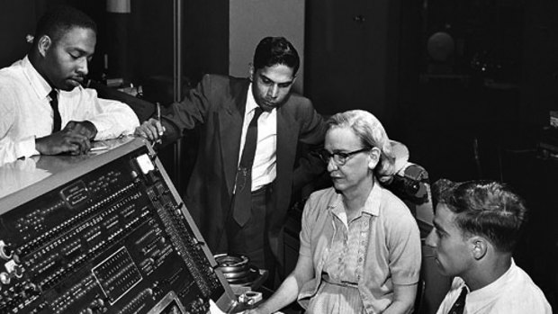 Computer scientist Grace Hopper at the UNIVAC, an early computer.
