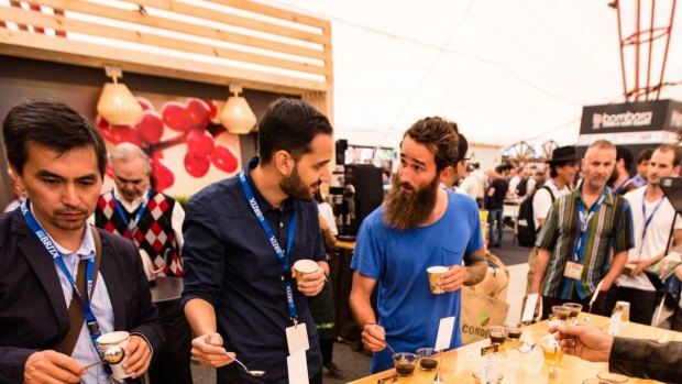 Melbourne's International Coffee Expo kicks off at the Showgrounds today. I'm pretty sure the guy in the blue shirt is Andrew Hansen from the Chaser's barista brother. 