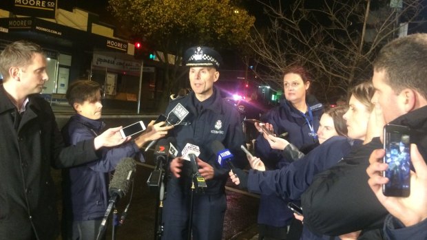 Victoria Police Deputy Commissioner Andrew Crisp speaking to reporters.