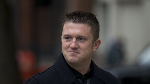 Tommy Robinson the former leader of the far-right EDL "English Defence League" group arrives for an appearance at court in London in 2013.