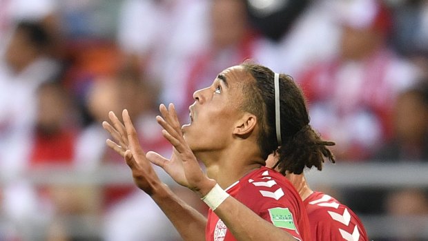 Taking the lead: Yussuf Yurary Poulsen looks to the skies after his goal.