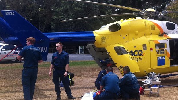 RACQ CareFlight crewman prepare to airlift the injured girl to hospital.