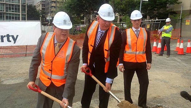 Tim Nicholls and Jeff Seeney turning the sod at 1 William Street.