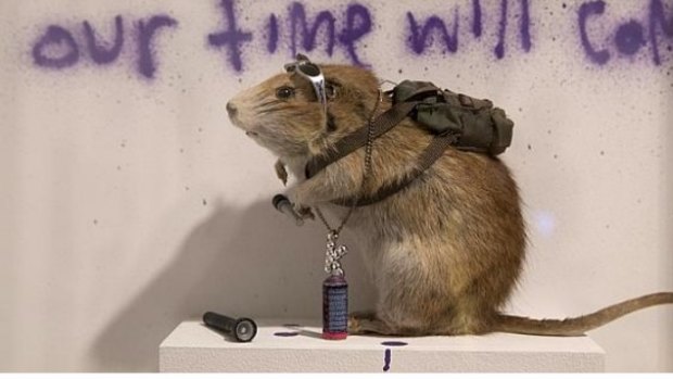 ‘Pest Control – Banksus Militus Vandalus’ was secretly installed in the Natural History Museum in 2004, where it stayed for two hours until staff spotted it and took it down. Photo: Reuters