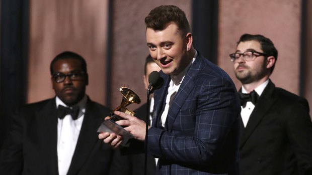 Sam Smith accepts the Grammy for record of the year.
