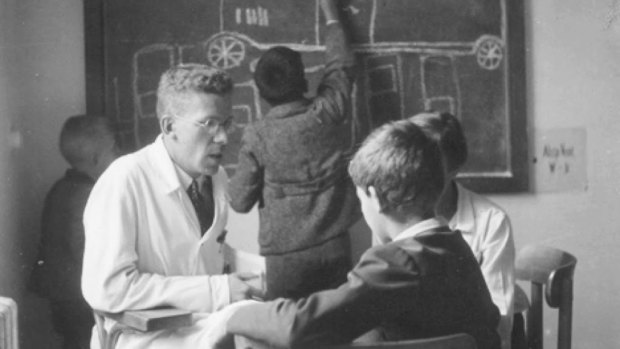 Hans Asperger with a child patient in an undated photograph.