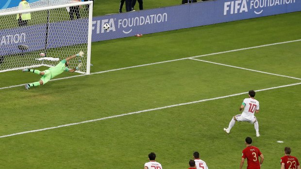 Iran's Karim Ansarifard shows Ronaldo how it's done and equalises for Iran.