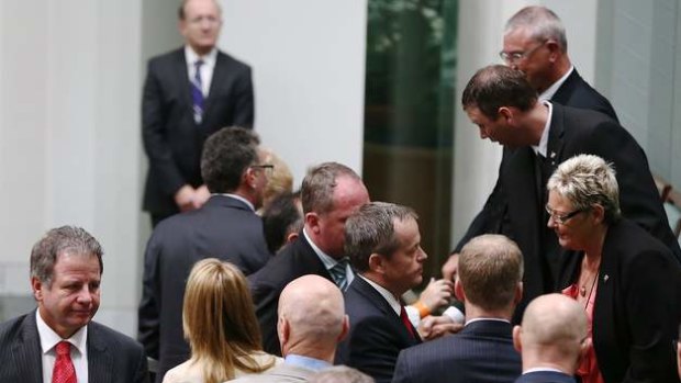 MPs greet the family of Corporal Cameron Baird VC MG. Photo: Alex Ellinghausen