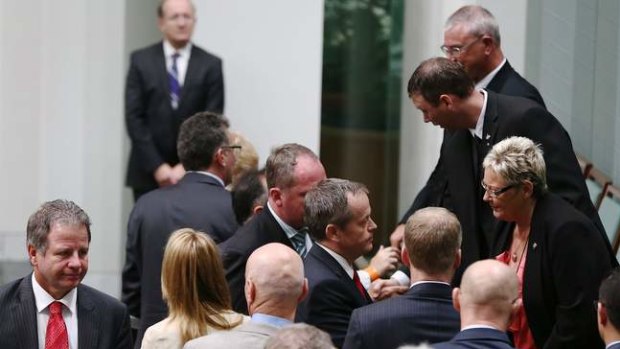 MPs greet the family of Corporal Cameron Baird VC MG. Photo: Alex Ellinghausen