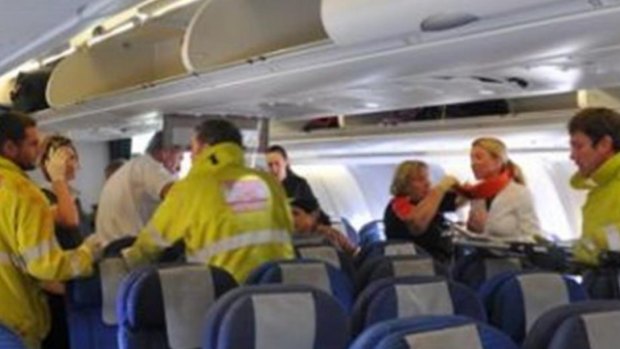 Rescue and medical workers from the Western Australian town of Exmouth met the flight after the emergency landing, 50 minutes after the first nosedive. 