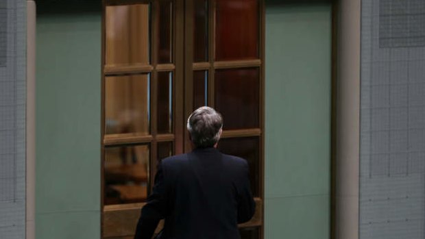 Labor MP Wayne Swan leaves the chamber. Photo: Alex Ellinghausen