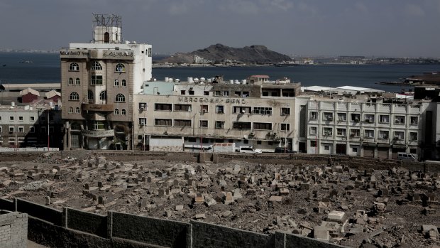 Once a peg in a thriving commercial centre that sprang up under colonial rule, the Mercedes Benz dealership sits empty and pockmarked with bullet holes in Aden, Yemen. 