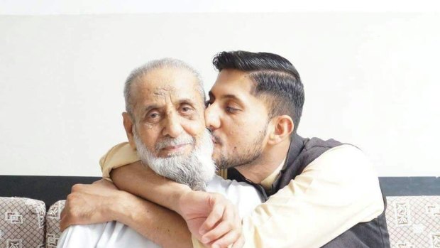Mohammad Akbar and his son Zeeshan, who was allegedly stabbed to death in Queanbeyan last year.