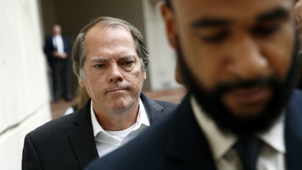 James Wolfe leaves a federal courthouse in Baltimore after a hearing on June 8.