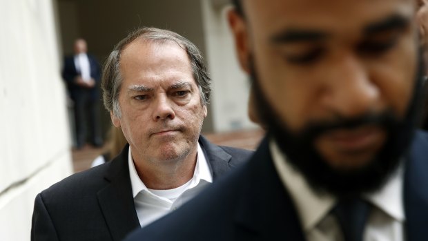 James Wolfe leaves a federal courthouse in Baltimore after a hearing on June 8.