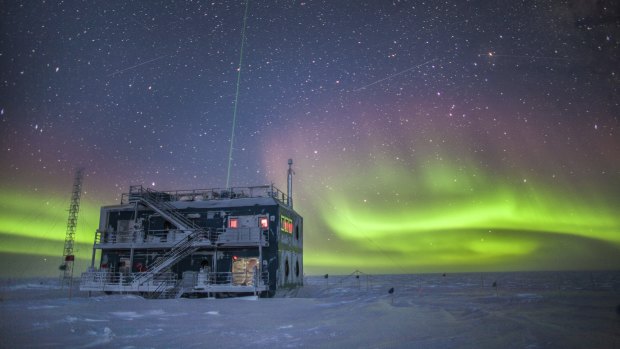 The aurora australis near the South Pole Atmospheric Research Observatory in Antarctica. When a hole in the ozone formed over Antarctica, countries around the world in 1987 agreed to phase out  chlorofluorocarbons (CFCs).