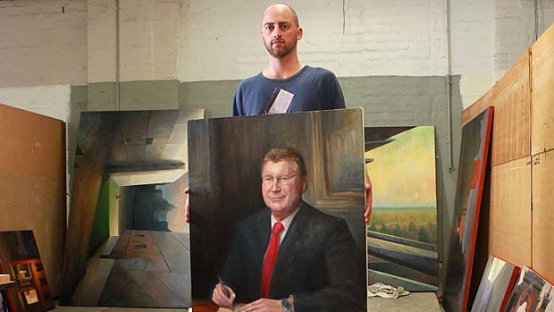 Artist Harley Manifold with his painting of Premier Denis Napthine.