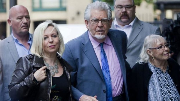Rolf Harris arrives at court with his wife Alwen Hughes and daughter Bindi.