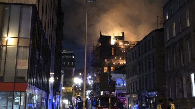Flames rise from the Glasgow School of Art's Mackintosh Building.