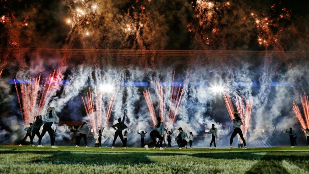 Dancers, fireworks and music brought the crowd into the game.