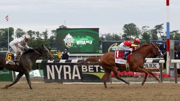 Superior: Justify carries the China Horse Club silks to victory in the Belmont Stakes to complete the Triple Crown. 