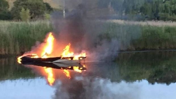 The ski boat that caught fire at Curdies River, north of Port Campbell.