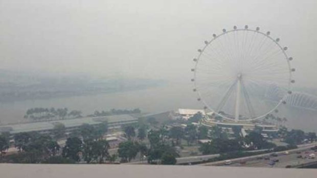 The disappearing view of the Esplanade in Singapore due to fires in Indonesia - three days ago.