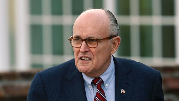 Also putting pressure on US Justice Department: Former New York mayor Rudy Giuliani.