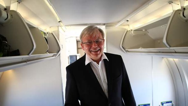 Prime Minister Kevin Rudd joins the media charter plane to fly to Kununurra from Darwin on Wednesday.
