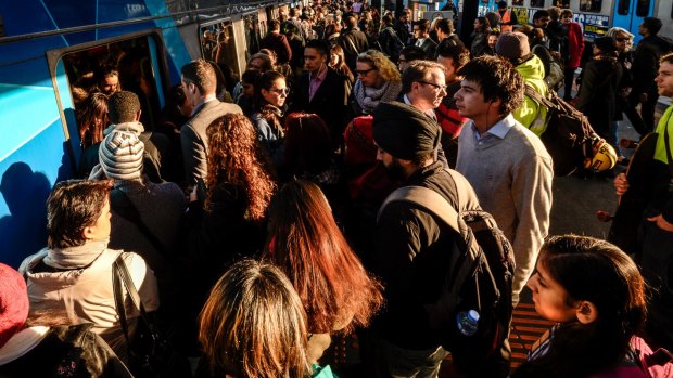 The crush and chaos at North Melbourne after the Craigieburn line was suspended today.