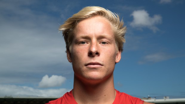Head knock: Isaac Heeney will need to improve quickly if he's to be fit to take on Geelong this Thursday.