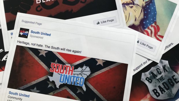 Facebook ads linked to a Russian effort to disrupt the American political process and stir up tensions around divisive social issues, released by members of the US House Intelligence committee, are photographed in Washington. 