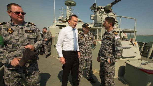 Then-Opposition Leader Tony Abbott on board the HMAS Bundaberg in 2012.