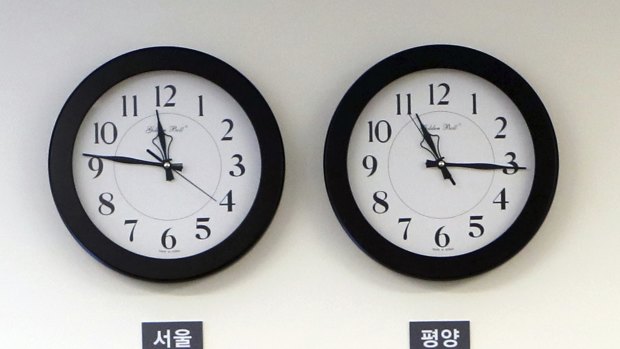 Seoul time zone clock, left, and Pyongyang time zone clock on April 27.