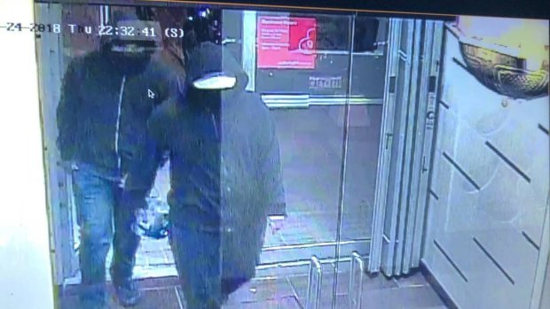 Peel Police tweeted this photo of two suspected entering the restaurant before detonating an improvised bomb.