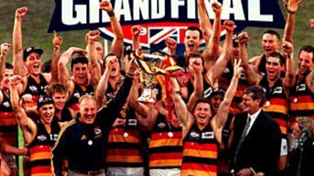 Adelaide celebrate after winning the 1998 flag.