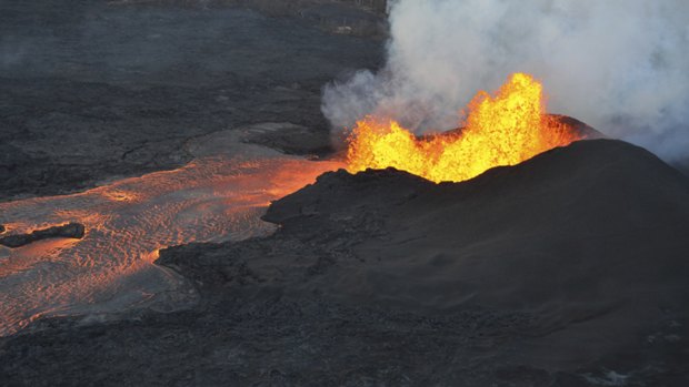 Lava spouts from a fissure near Pahoa in Hawaii on Tuesday.