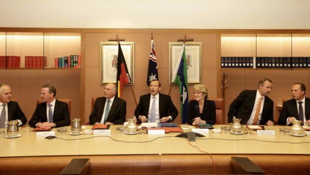 Prime Minister Tony Abbott meets with his ministry in the cabinet room at Parliament House on Wednesday.