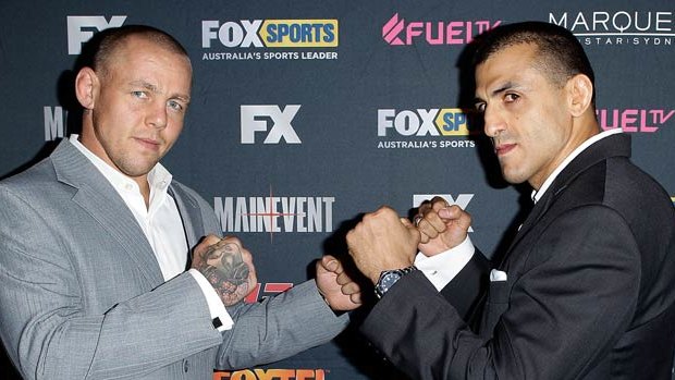Australian coach George Sotiropoulos (right) faces off against Team UK coach Ross Pearson at the television launch of The Ultimate Fighter: The Smashes.