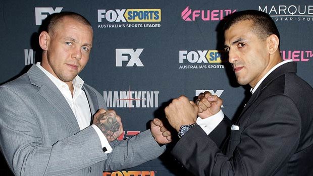 Australian coach George Sotiropoulos (right) faces off against Team UK coach Ross Pearson at the television launch of The Ultimate Fighter: The Smashes.