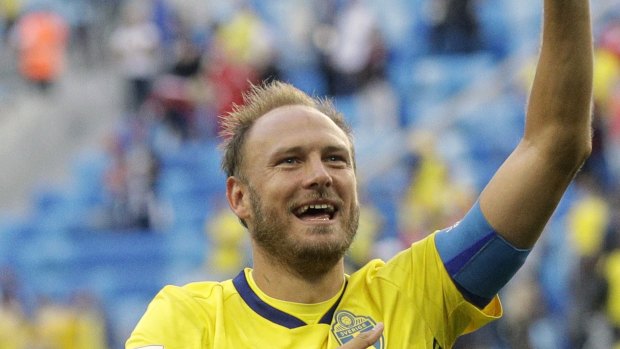 Sweden's Andreas Granqvist waves to the fans after the round of 16 match against Switzerland.
