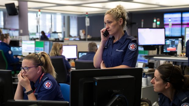 Staff at Sydney's ambulance control centre during a difficult call.