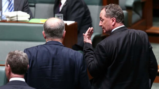 Immigration Minister Scott Morrison and Agriculture Minister Barnaby Joyce depart question time on Wednesday.