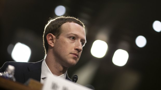 Mark Zuckerberg, chief executive officer and founder of Facebook Inc., listens during a joint hearing of the Senate Judiciary and Commerce Committees in Washington.