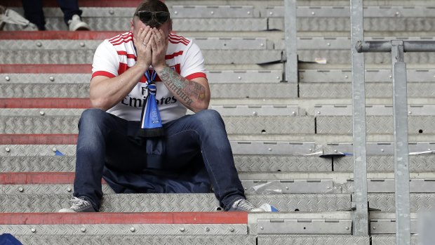 A devastated Hamburg fan after the match.