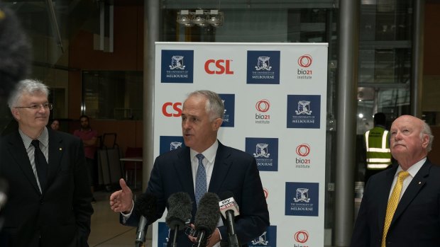 Glyn Davis (left) and Malcolm Turnbull (centre) jousted over industry collaboration last year. Pictured with CSL chairman John Shine at the announcement of a 5000-square-metre expansion of the university's  Bio21 Molecular Science and Biotechnology Institute