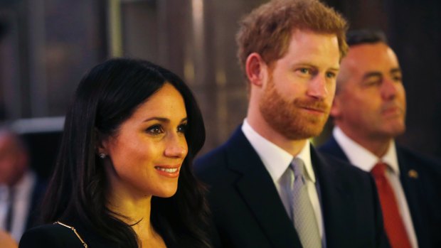 Prince Harry and Meghan Markle attend a reception at Australia House in London, Saturday, April 21.